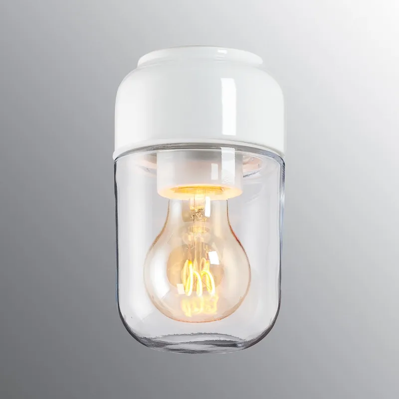 Ohm 100/170 valaisin. Valkoinen suora IP44 posliinikanta, E27 lampunpidikkeella. Kirkas lasikupu 84,5mm kierteellä. Tarjous